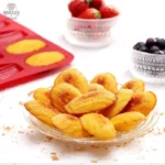 Ustensile de cuisine pour réaliser des madeleines en forme allongée